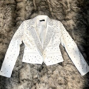 Studded white leather jacket. AKIRA